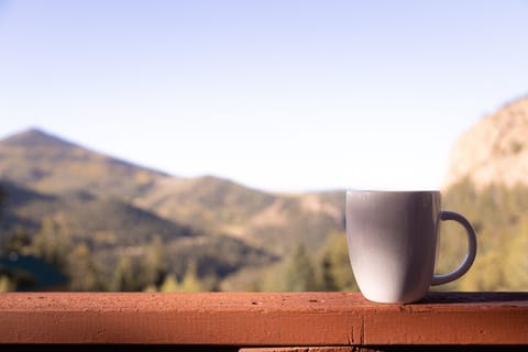 Sip in the Splendor: Enjoy a Cup of Serenity on Our Balcony with Stunning Views 🌅☕🍃
