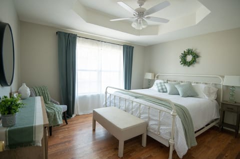 Master bedroom with a kingsize bed. All our beds are hotel quality.