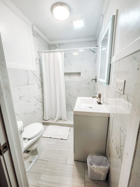 Combined shower/tub, hair dryer, towels, soap