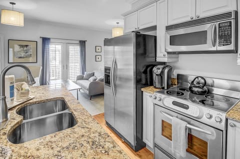 The carriage house kitchen is equipped with a Keurig coffee maker, ensuring you have access to your favorite brews with a selection of coffee pods available. Enjoy the convenience of a freshly brewed cup of coffee whenever you desire during your stay.