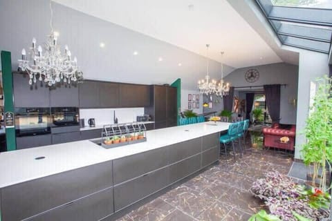 Cook up a feast or pour your favourite cocktail in our open plan kitchen and entertaining area