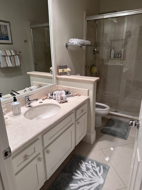 Combined shower/tub, hair dryer, towels, soap