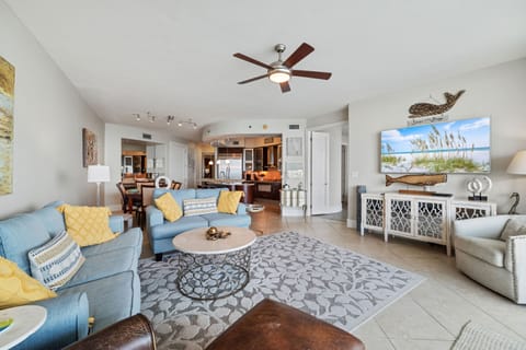 This thoughtfully designed living space maximizes natural light and integrates seamlessly with the surrounding environment. The open-concept layout and expansive windows create a bright and airy atmosphere.