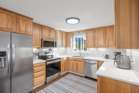 Bright and clean kitchen with new appliances