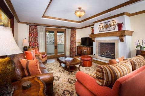 Relax and unwind with a movie or in front of the fireplace in the spacious living area