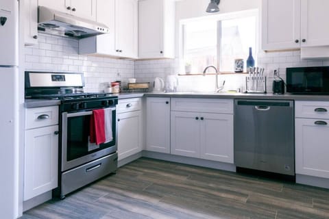 The dishwasher makes the clean-up easy after cooking that hearty meal in this well-equipped kitchen.