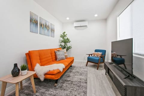 Unwind and relax in our comfortable living room with a 50` widescreen TV and HDMI cable for your entertainment needs.