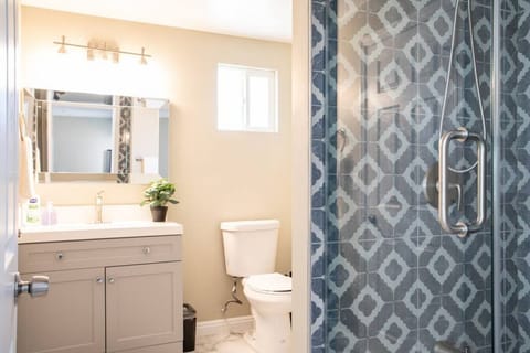 Indulge in a spa-like experience in our well-appointed bathroom with a luxurious walk-in shower.