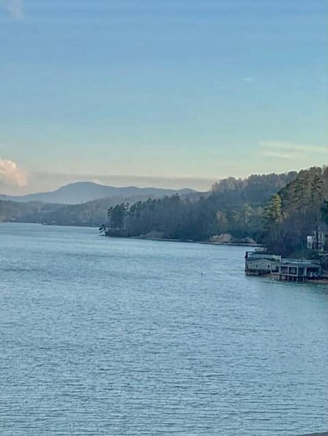 Amazing views of Lake Lure and the surrounding mountains from the upper level lakefront balcony off the family room.