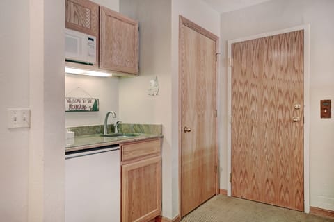 Keep refreshments and snacks chilled in the mini fridge.