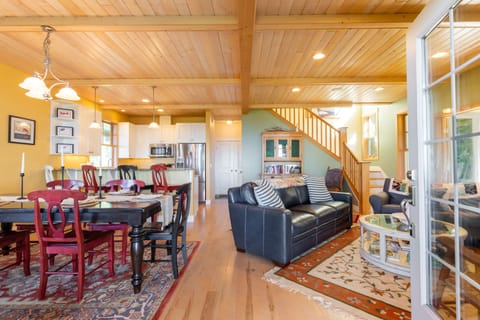 Open-concept craftsman-style home, the living room and dining area seamlessly blend together.
