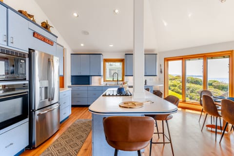 A kitchen that celebrates the sea's beauty in every shade of blue.