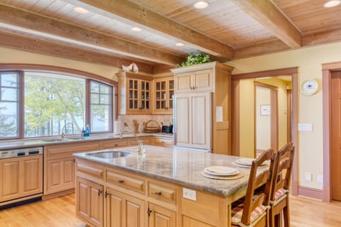 A modern kitchen with a rustic and wooden aesthetic