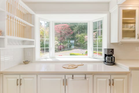 Expansive window to bathe the kitchen in natural light.