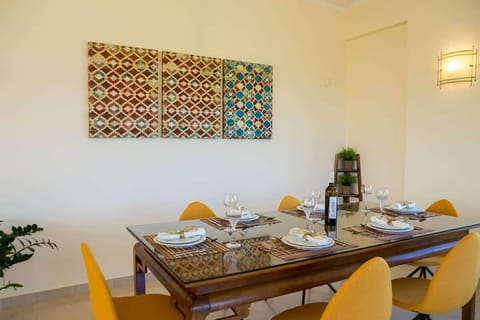 A rustic wooden table infused with contemporary elements to enhance your dining experience.