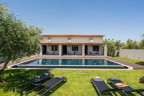 Serene Pool Area with Lush Garden Views