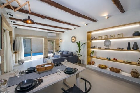 Glimpse of our dining table and unique modern interior