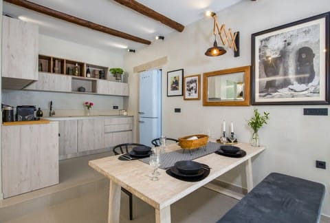 Cook, Dine, Delight: Fully Equipped Kitchen in a Stylish Modern Retreat