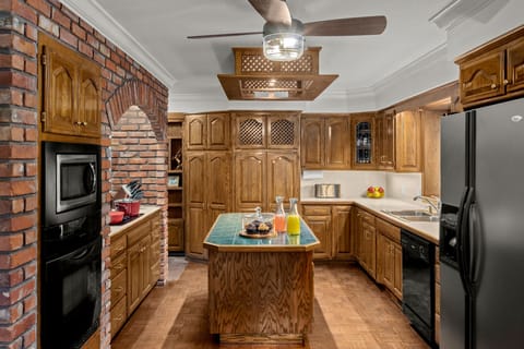 The kitchen is stocked with high quality cookware, utensils, sharp knives, and more.