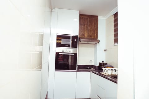 Fridge, microwave, stovetop, electric kettle