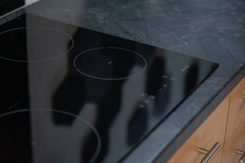 A fully equipped kitchen for cooking enthusiasts. A perfect space for shared meals after a day at the beach.