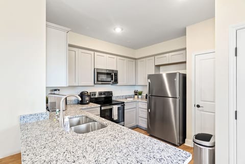 Plenty of workspace on the new granite countertops.