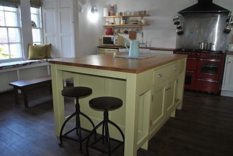 A striking central island makes the kitchen a sociable space