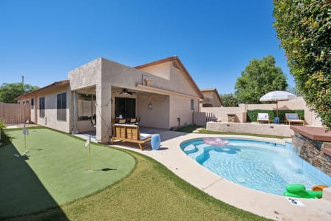 Spa pool, mini putt, lounge chairs, fire pit, and patio