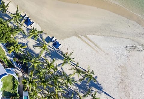 On the beach, sun loungers, beach towels