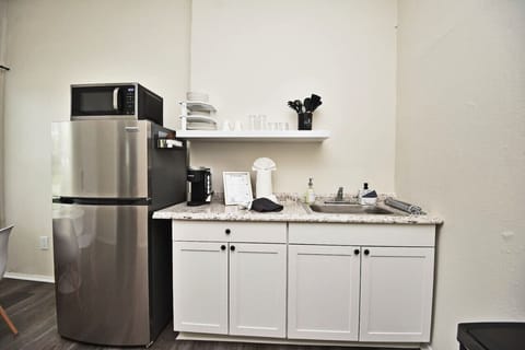 Fridge, microwave, coffee/tea maker, toaster