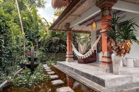 Private garden with a hammock to relax in