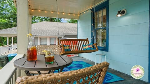 Have a drink, a swing, and watch the sun set on the front porch!