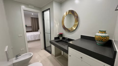 Jetted tub, eco-friendly toiletries, hair dryer, bathrobes