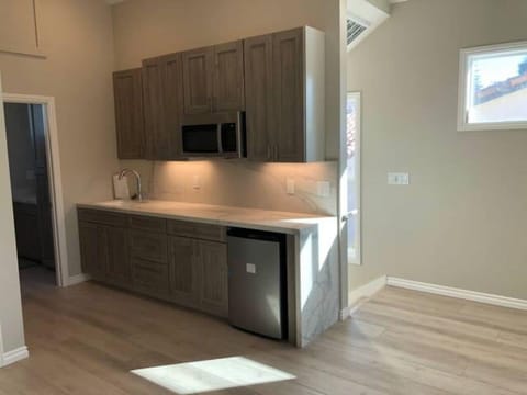 Kitchen. Counter top cooktop provided.