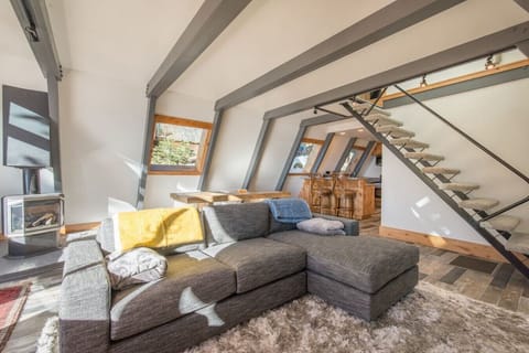 Open concept living / dining / kitchen with views of Lake Tahoe