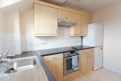 Fridge, oven, dining tables