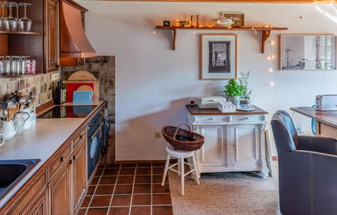 Fridge, stovetop, coffee/tea maker, cookware/dishes/utensils