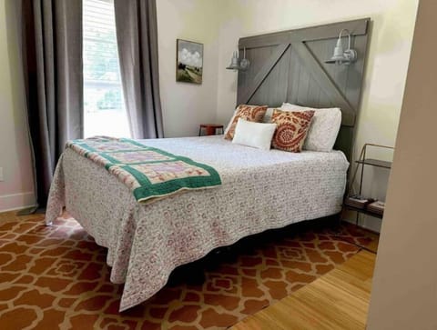 [Bedroom #3]
Queen bed with Roku Smart TV.  Shares hallway bathroom