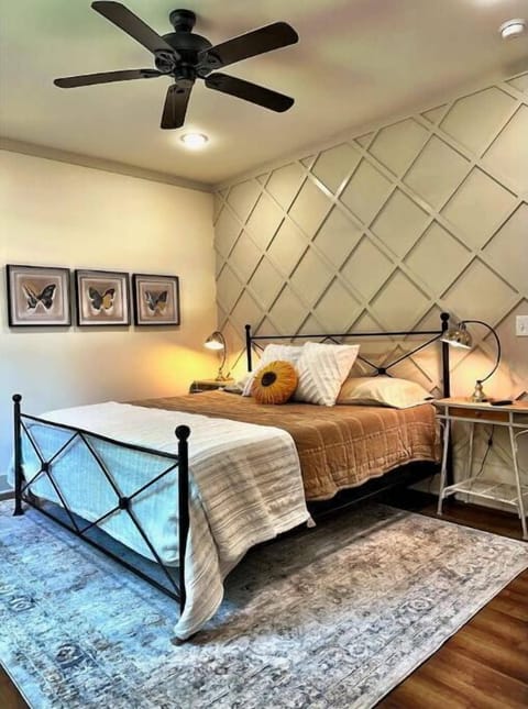 [Primary Bedroom]
King bed as well as 43" Roku Smart TV and en suite bathroom