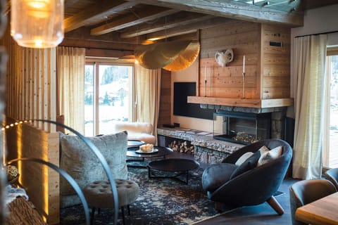 Living room with tv and fireplace