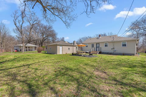 The large fenced-in yard provides plenty of room to run and enjoy nature.