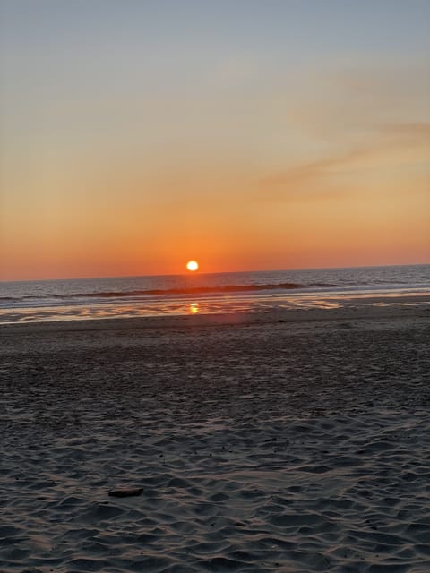 Enjoy the sunset just a 5 mins walk to the beach 