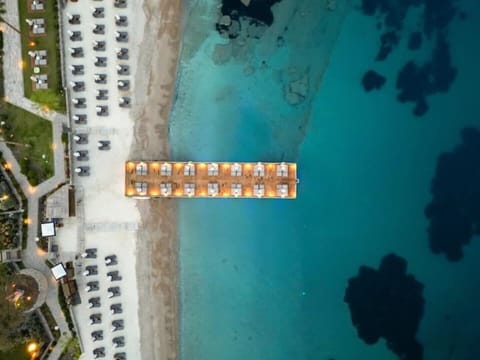 On the beach, sun loungers, beach towels