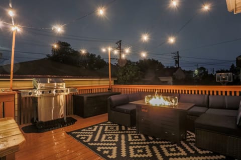 The large, private, back deck is the perfect place to be at night