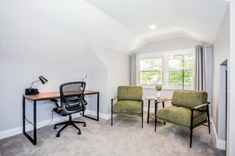 The bedroom has a full desk as well for those who need a place to work