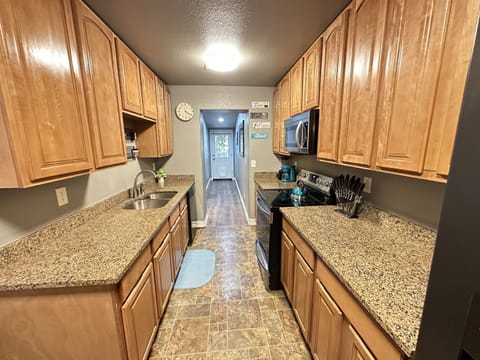 Create memorable meals in our kitchen, stocked with utensils and kitchenware.