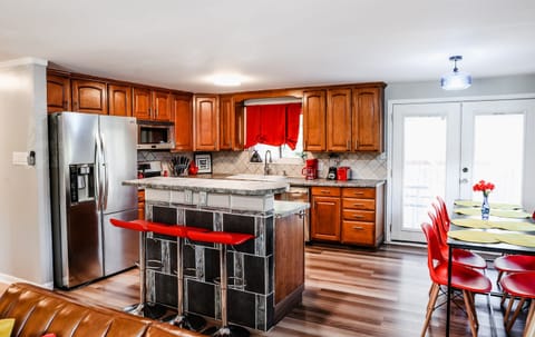 Feast and Fun for All – Create memorable meals in our kitchen, stocked with utensils and kitchenware. Share laughter and great food at the 8-seater dining table