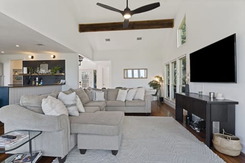 Stretch out and enjoy your favorite shows in style on our large, comfy sectional sofa in the living area.