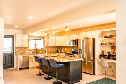 Prepare fresh meals with ease in this fully equipped, modern kitchen, a central amenity that elevates your stay at our Brookings, Oregon vacation rental.