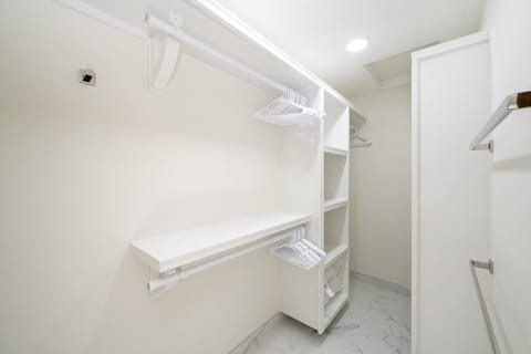 Guest suite includes a spacious walk-in closet—perfect for extended stays or unpack-and-relax living.